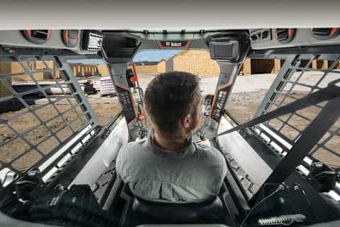A Behind-the-Operator View of a Bobcat Compact Loader Cab Interior