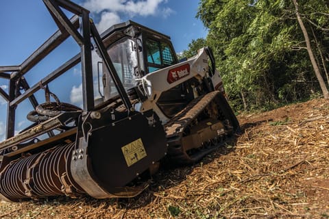 T86 Compact Track Loader with close up drum mulcher