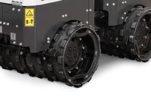 Side view of the Bobcat TR75 trench roller showing the drum extensions.