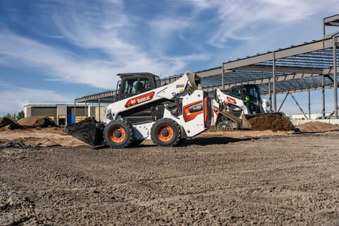 Bobcat S86 And T86 Compact Loaders Working On A Construction Site