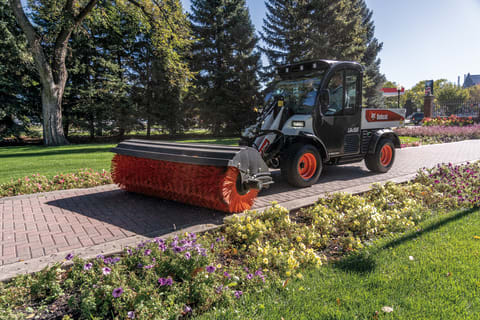 Closeup Detail View of an Angle Broom Attachment on a Utility Work