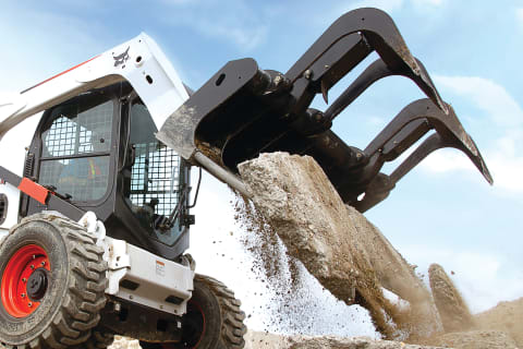 Skid-Steer Loader with attachment
