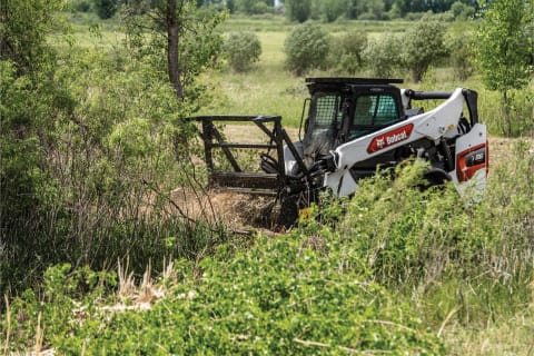 Bobcat T86 compact loader working with drum mulcher