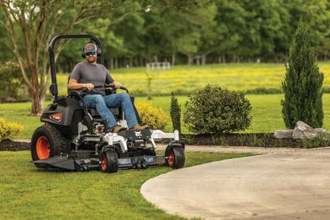 A Bobcat ZT7000 Zero-Turn Commercial Mower Getting Close to a Concrete Sidewalk