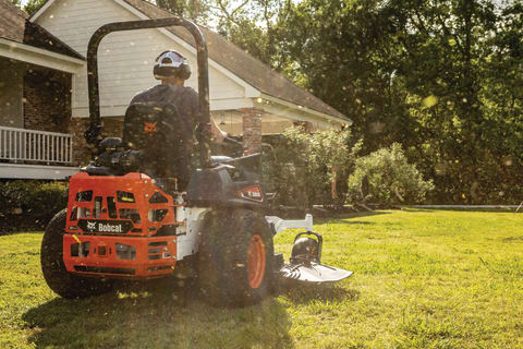  Bobcat ZT7000 Zero-Turn Mower Is Used to Cut Grass in a Residential Yard 