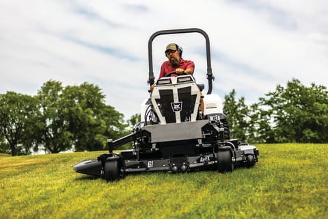 Bobcat AT450 Articulating Tractor With AirFX Mower Attachment Working On A Slope