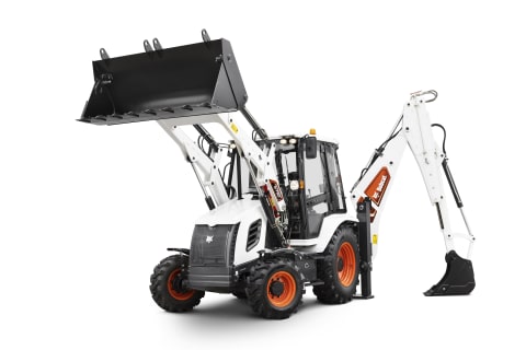 Крупный план внутреннего пространства кабины экскаватора-погрузчика Bobcat B730 на строительной площадке.