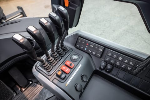 Operator Controls in the Cab of a Bobcat D70S-9 Forklift