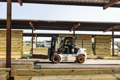 A Bobcat D70S-9 Forklift Works in a Lumberyard