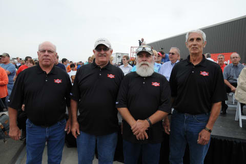 Brothers Warren, Curt, Wayne and Marcus Anderson stand for a photo together during the Bobcat Millionth Loader Ceremony