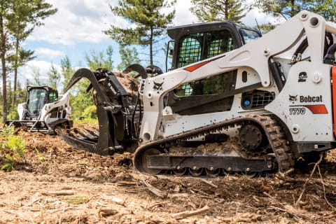 Bobcat T770 compact track loader with grapple on construction site