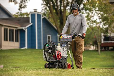 An Operator Uses the Bobcat SC24H Sod Cutter to Cut Sod on a Residential Property