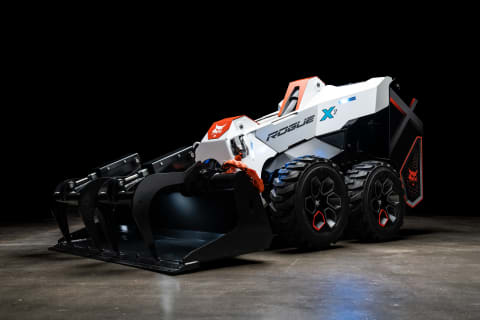 A Bobcat RogueX2 Skid-Steer Loader Parked in a Dimly Lit Area