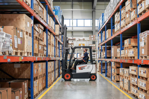 A Bobcat B25X-7 Plus Forklift Works in a Warehouse