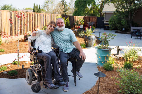 Julie and Rich Rummer in Their Newly Renovated Backyard