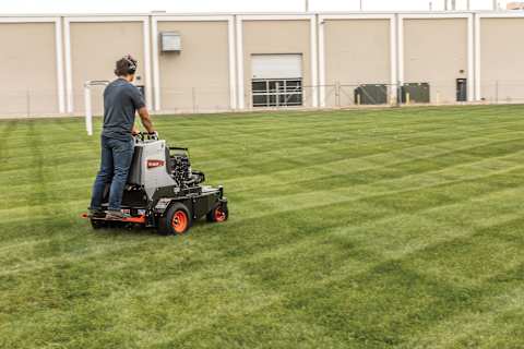 An Operator Aerates a Lawn With the Bobcat AE30S Aerator