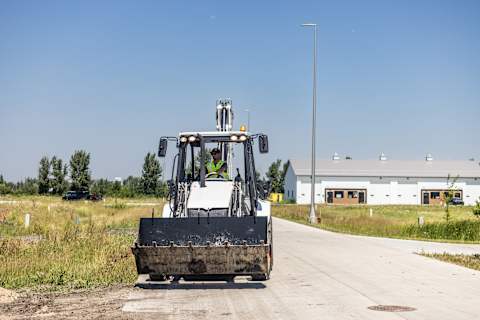 A Bobcat B760 Traveling Down a Road