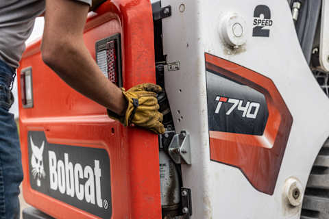 Rear End of Bobcat t740 Compact Track Loader Being Opened by Operator