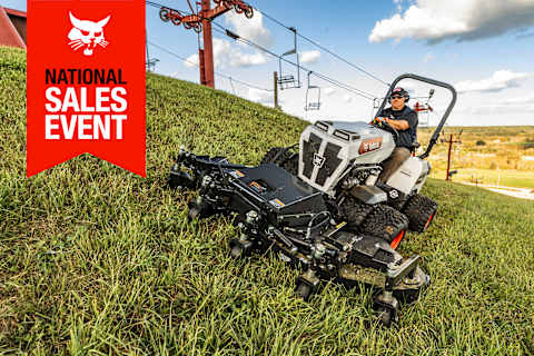 An Operator Mows Grass at an Angle Using the Bobcat AT450 Articulating Tractor and Flex Deck Mower 