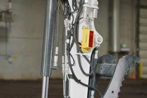 The Automatic Receiver Bench on the Arm of a Bobcat Compact Excavator 