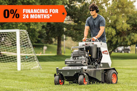 A Bobcat AE30S Aerator Aerates a Soccer Field; A 0% Financing Banner Is in the Top-Left Corner