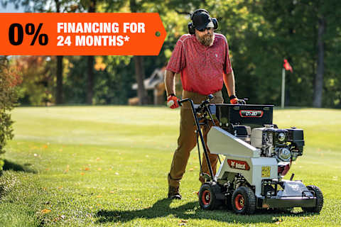 An Operator Uses a Bobcat DT20 Dethatcher on a Golf Course Green; A 0% Financing Offer Banner Is in the Top-Left Corner