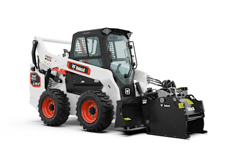 A Bobcat S76-2 Skid-Steer Loader Equipped With a Planer Attachment on a White Background