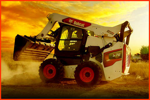 Bobcat Skid-Steer Loader  Dumping Dirt into a Pile with Operator Inside the Cab