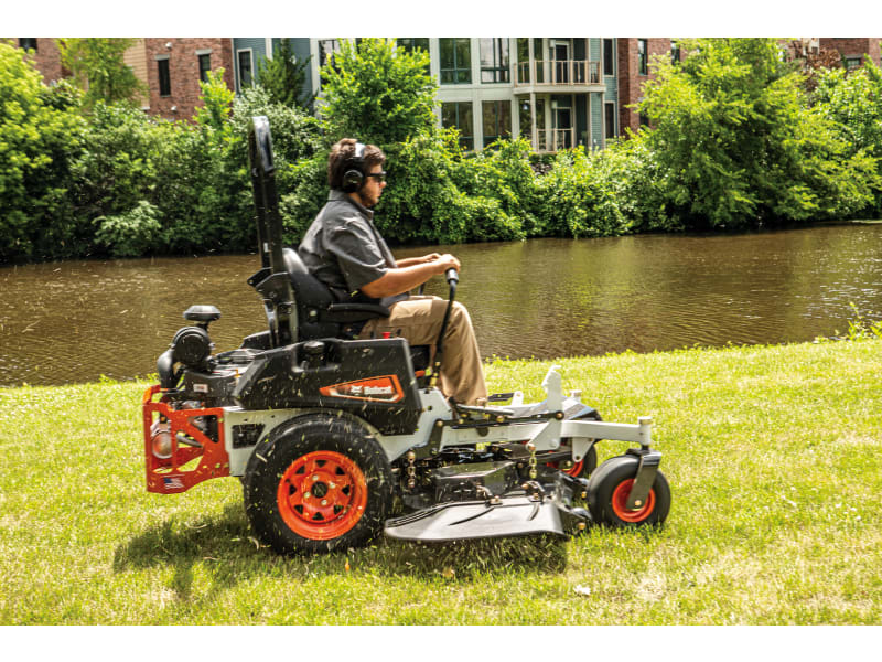 Zero turn mower with tracks top