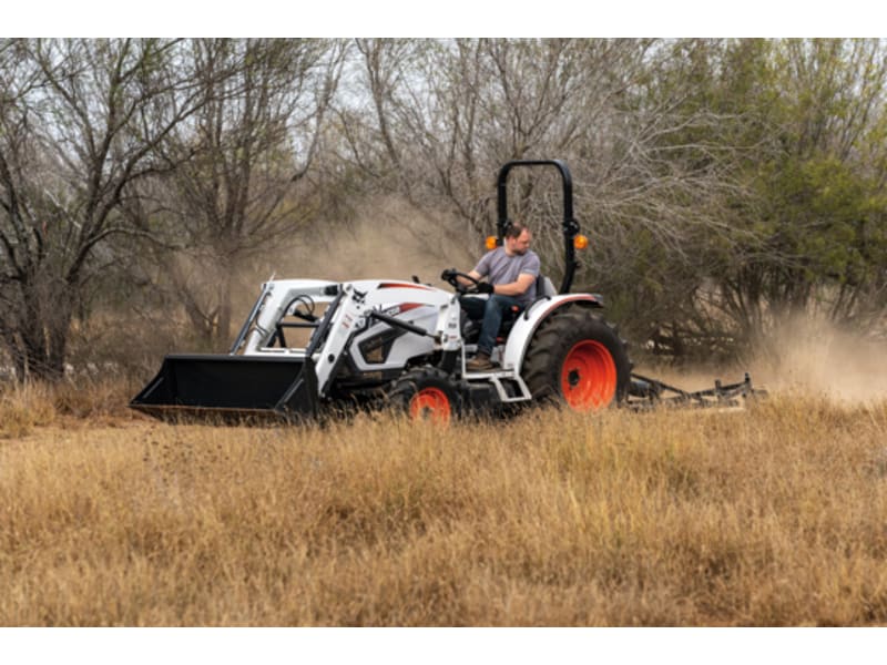 Rotary cutter tractor top