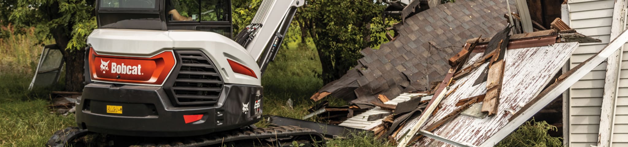 Bobcat E60 Compact (Mini) Excavator Breaks Down Building