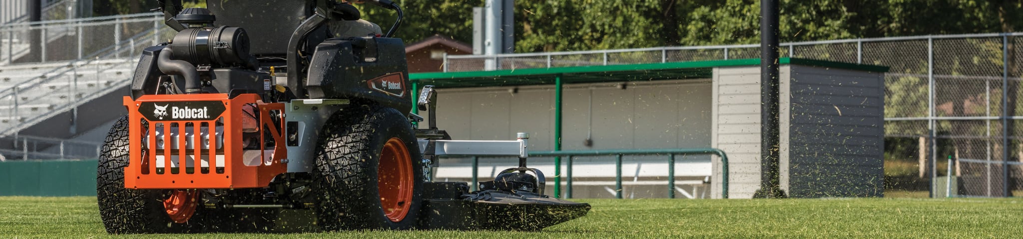 An Operator Mows a Sports Facility With a Bobcat ZT5000 Zero-Turn Mower