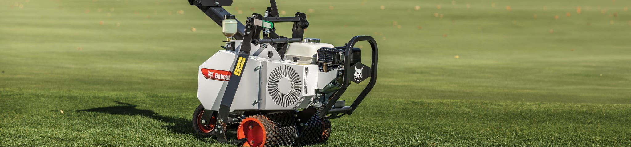 A Bobcat SC24H Sod Cutter Parked on Perfectly Manicured Grass