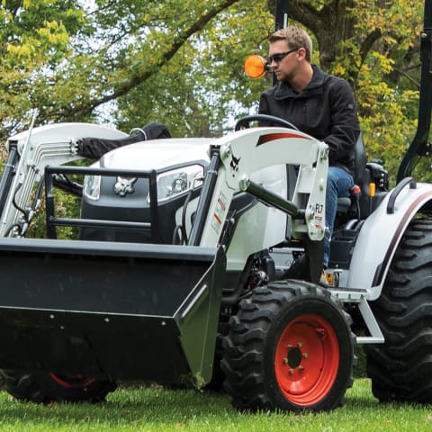 Lawn tractors with deals front end loaders