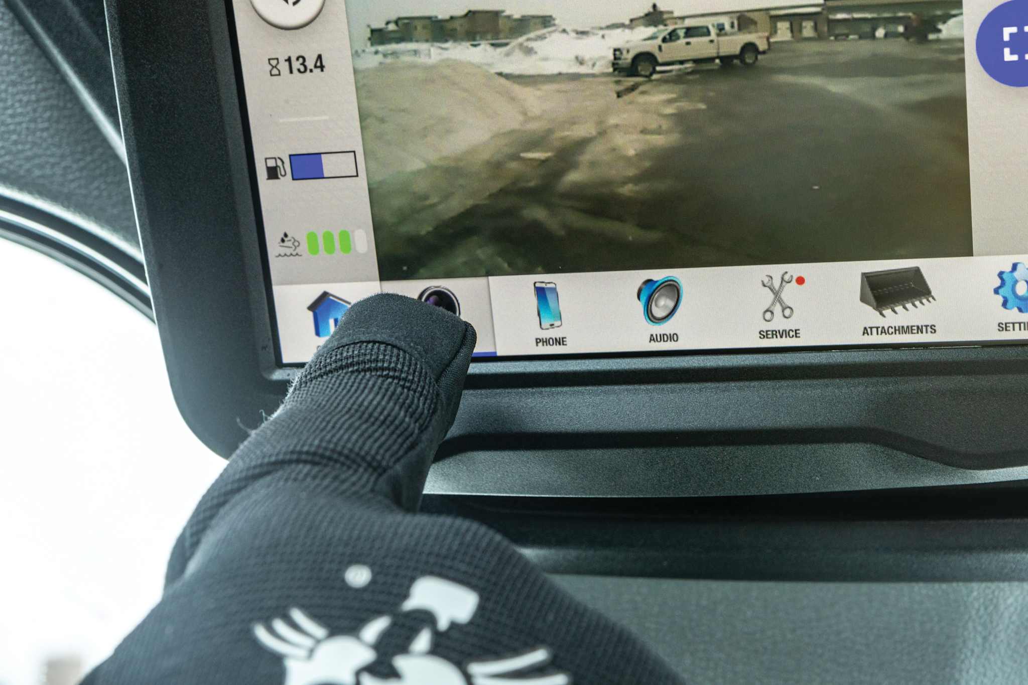 Touchscreen display and rearview camera in Bobcat S86 loader cab