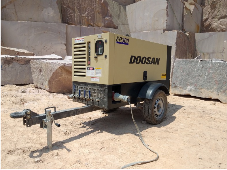 electric compressor in rock quarry