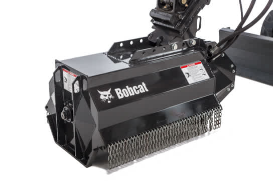 Close-up studio shot of Bobcat flail mower attachment. 