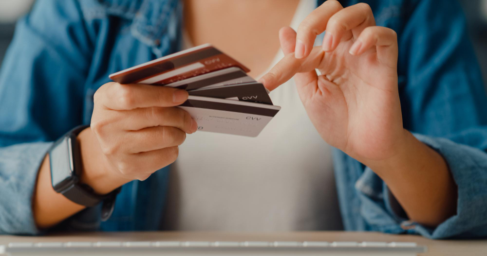 Credit Card Debt Settlement vs Debt Consolidation: Pros & Cons