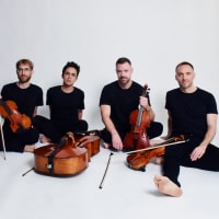 Jack Quartet seated with instruments