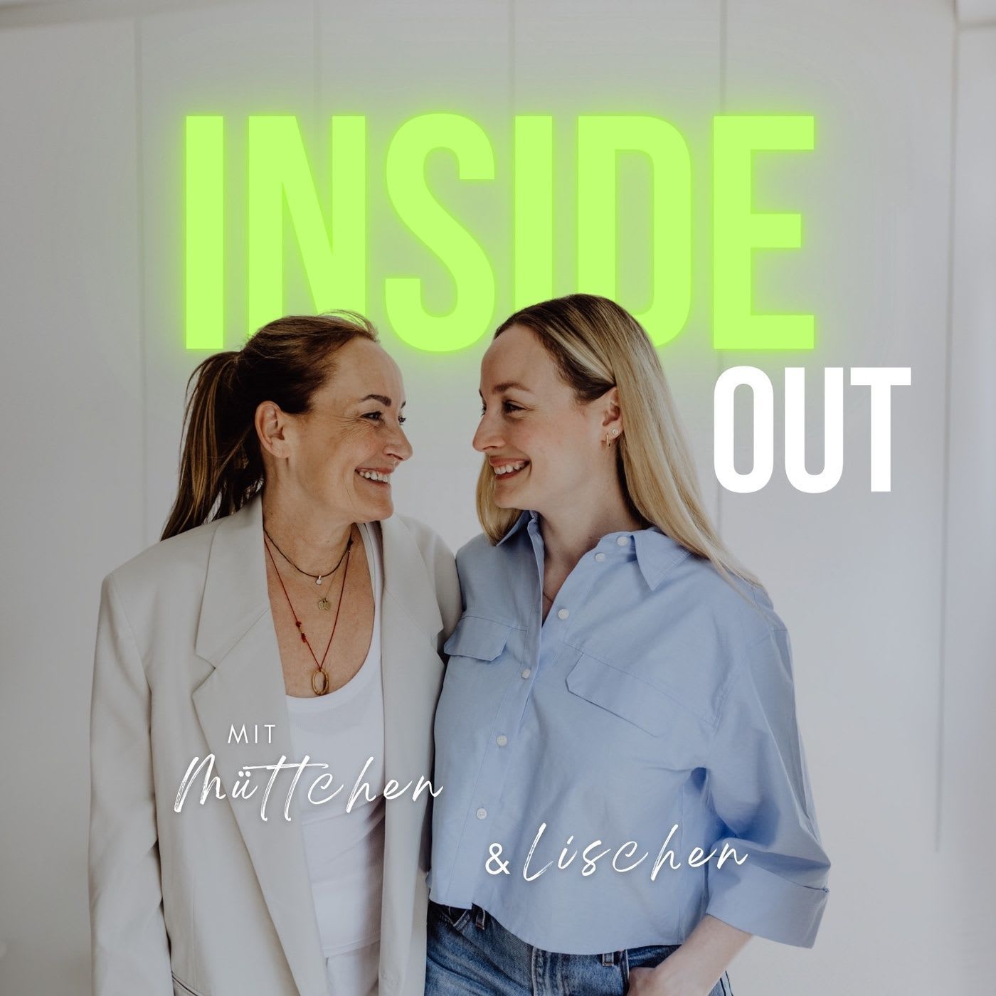 Two smiling women looking at each other amicably against a white background with the large green and white text INSIDE OUT.