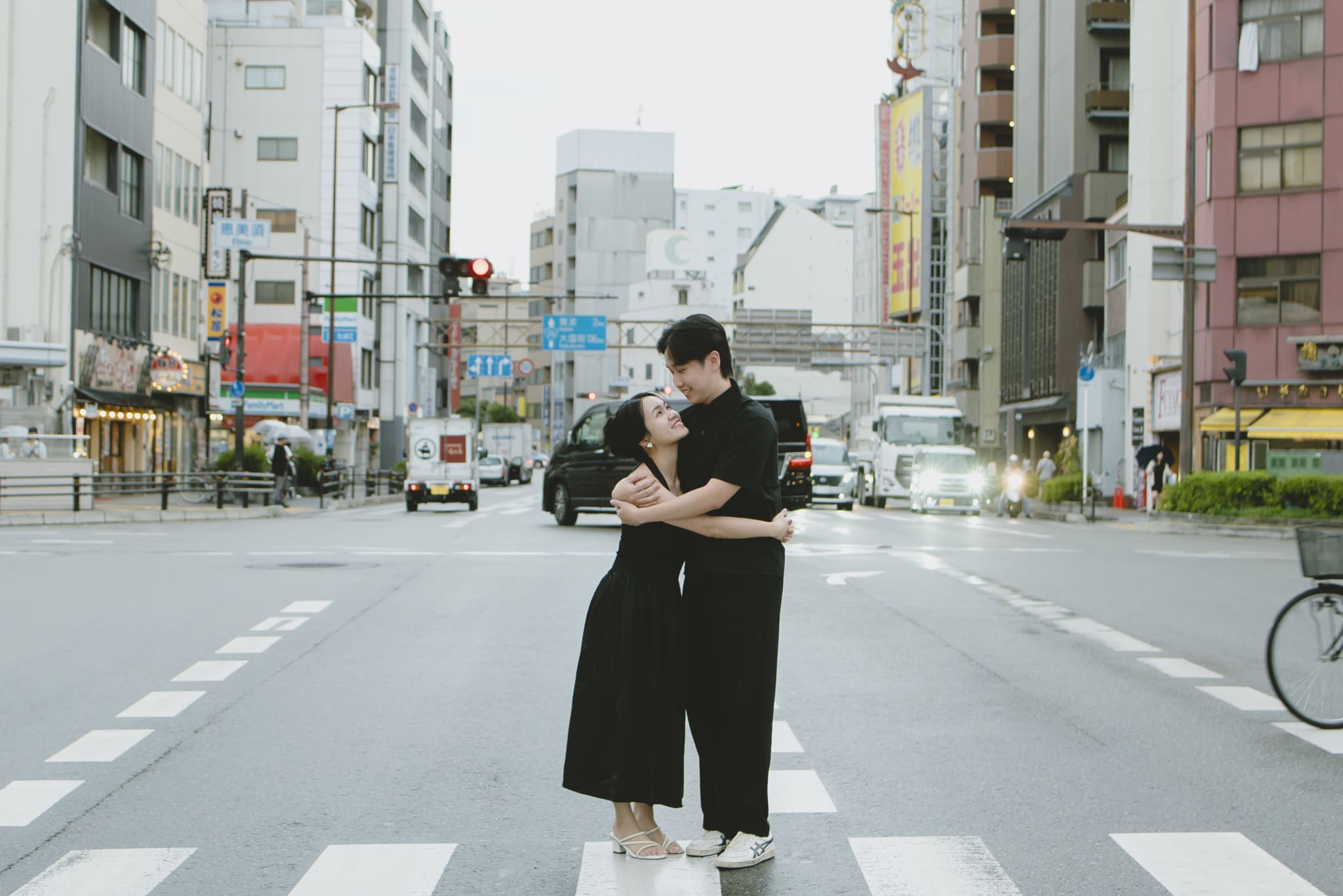 Hugging at sidewalk
