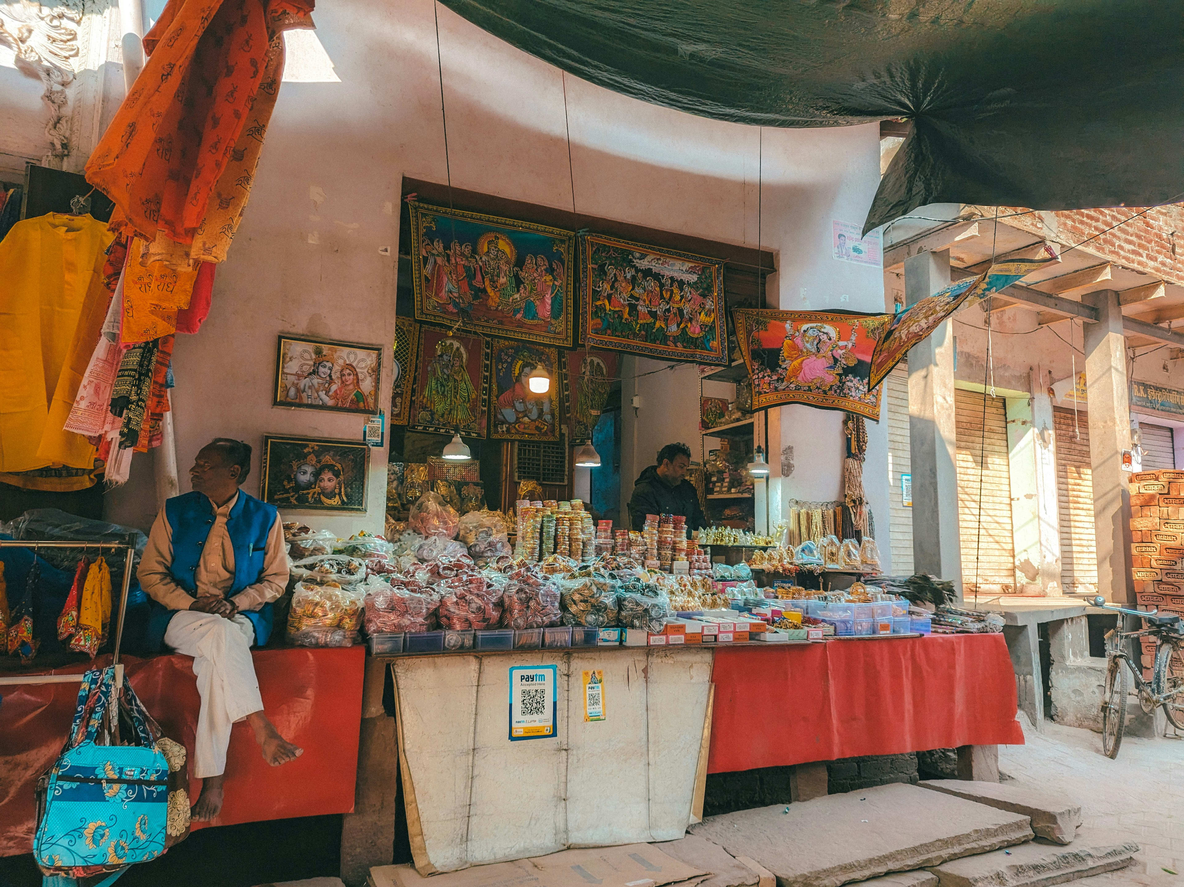 Religious goods displayed at a traditional market stall