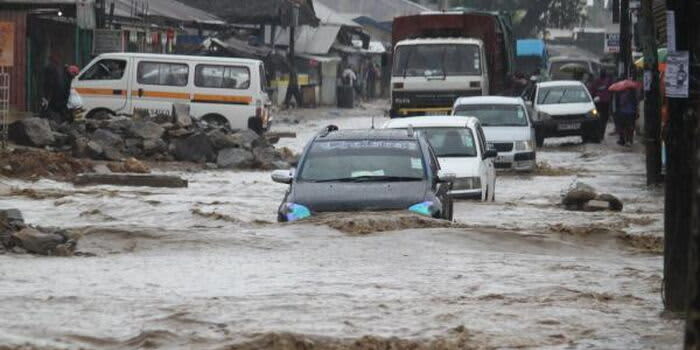 Vehicles navigate a flooded road in Mombasa. /DAILY NATION
