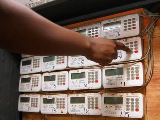 A photo of someone inserting KPLC tokens on their gadgets. /KPLC
