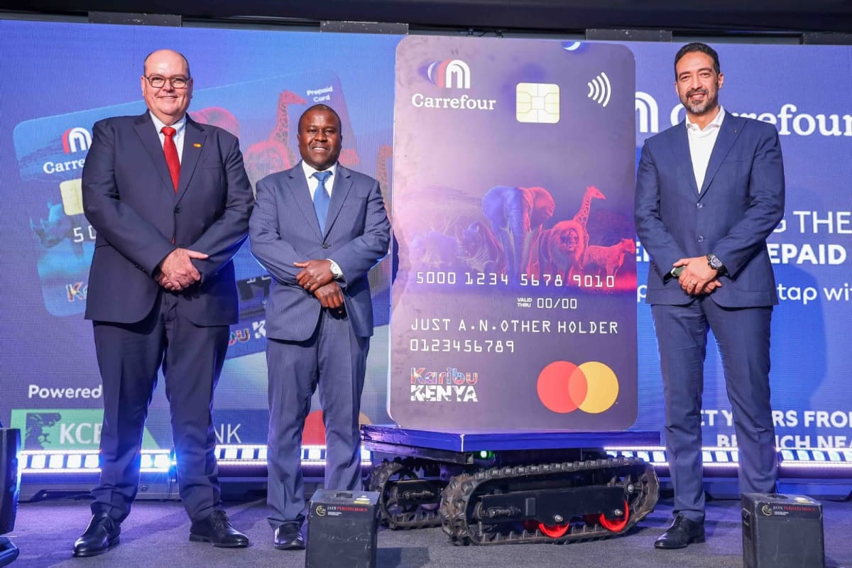 From left: Gabriel Swanepoel, Division President, Africa, Mastercard, John Wagacha, Head, FMCG, KCB Corporate Banking Division, and Rachid Nouri, Vice President – Finance, East Africa, Majid Al Futtaim Retail, officially unveil a prepaid card to help customers plan, manage and control their esentials spending