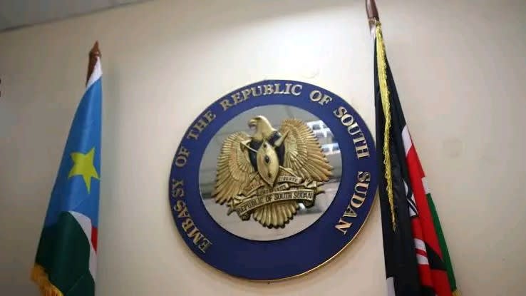 A photo of an emblem and flags at the South Sudan Embassy in Nairobi, Kenya. /SUDAN'S POST