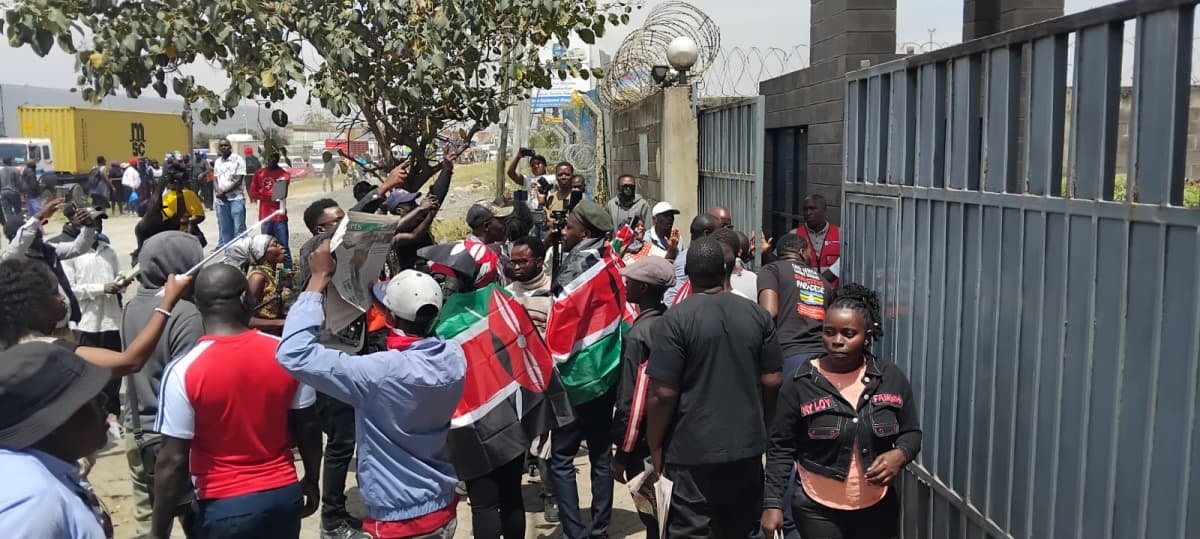 Pro-government protesters and human rights activists clash outside the Standard Media Group on Friday, October 2, 2026. /PHOTO