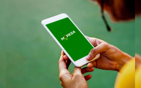 Photo of a person using MPESA on his phone. /FILE