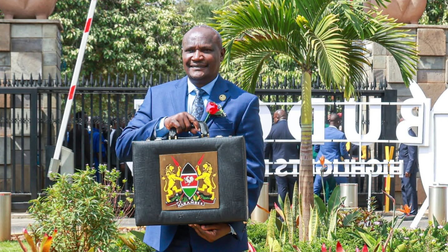 Treasury Cabinet Secretary (CS) John Mbadi poses with the iconic briefcase in front of Parliament ahead of the Budget Reading on June 11, 2026. /PARLIAMENT KENYA