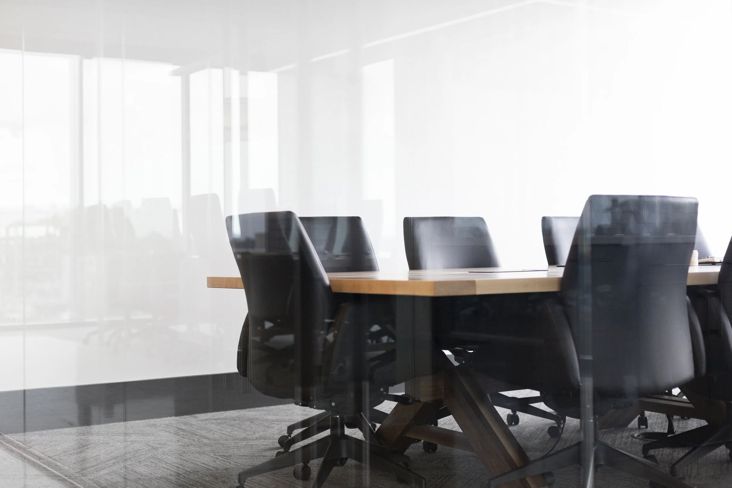A team meeting around a conference table.